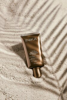 Getinte zonnebrandcr&egrave;me SPF50+ | Inika